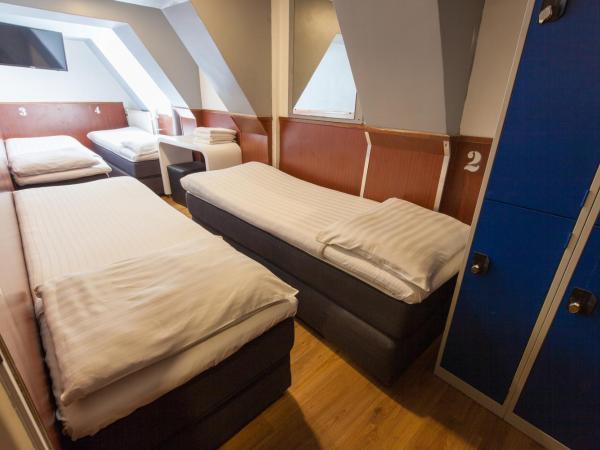 Travel Hotel Amsterdam : photo 3 de la chambre chambre quadruple avec lits simples