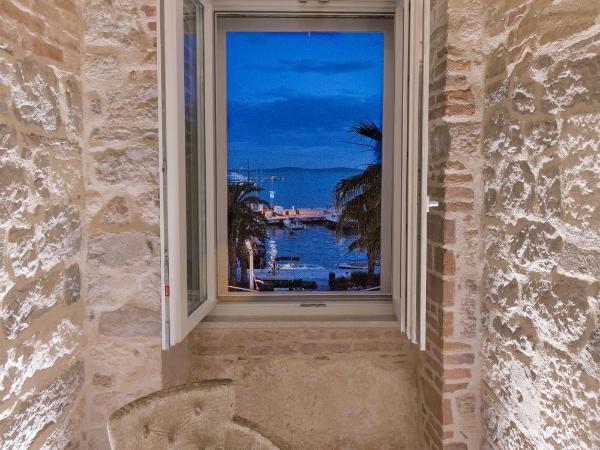 Riva Palace : photo 10 de la chambre chambre double ou lits jumeaux deluxe - vue sur mer