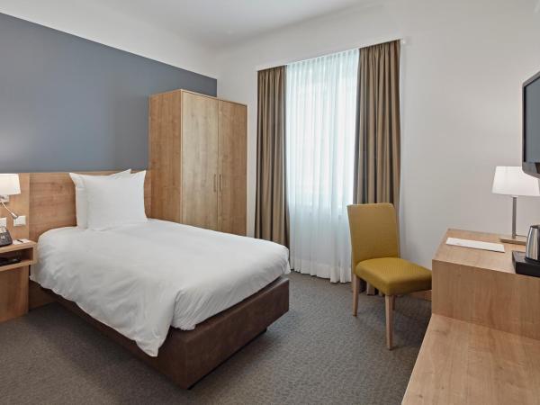 City Hotel : photo 5 de la chambre chambre simple standard avec douche