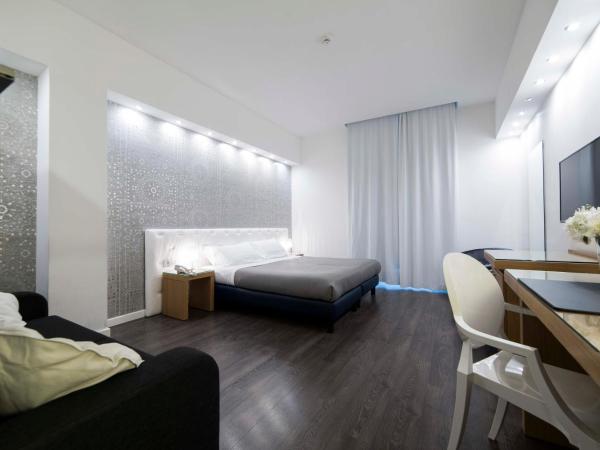 Hotel Montestella : photo 4 de la chambre chambre quadruple deluxe
