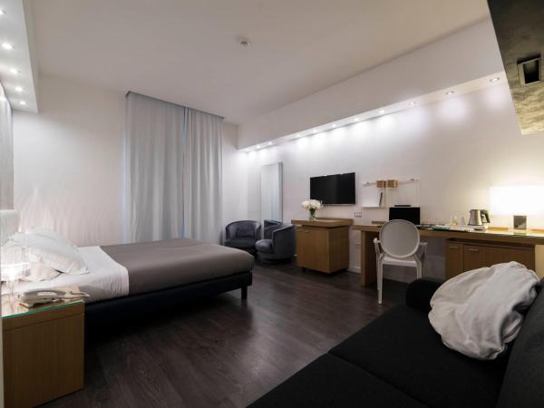 Hotel Montestella : photo 5 de la chambre chambre quadruple deluxe