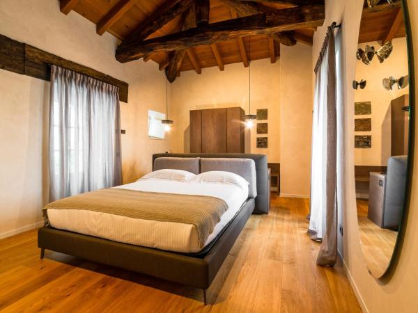 Relais San Vigilio al Castello : photo 8 de la chambre chambre double deluxe
