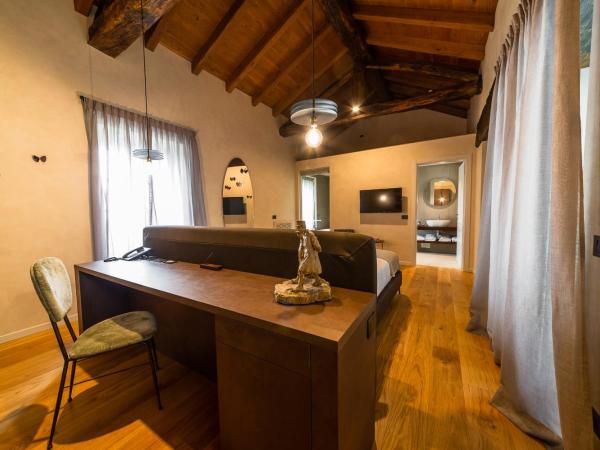 Relais San Vigilio al Castello : photo 7 de la chambre chambre double deluxe