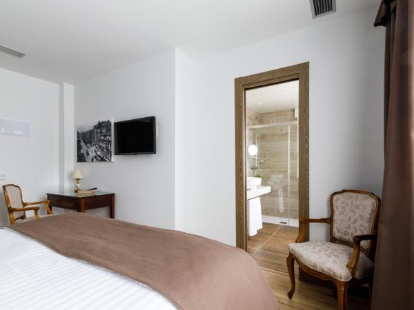 Suite Home Pinares : photo 6 de la chambre chambre double standard