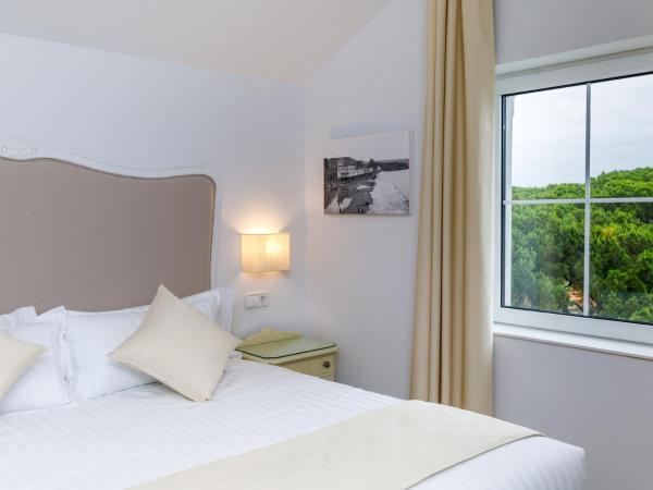 Suite Home Pinares : photo 5 de la chambre chambre double ou lits jumeaux supérieure avec terrasse