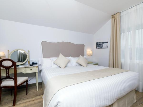 Suite Home Pinares : photo 9 de la chambre chambre double ou lits jumeaux supérieure avec terrasse