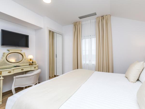 Suite Home Pinares : photo 5 de la chambre chambre deluxe double ou lits jumeaux