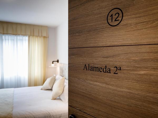 Suite Home Pinares : photo 1 de la chambre chambre double ou lits jumeaux