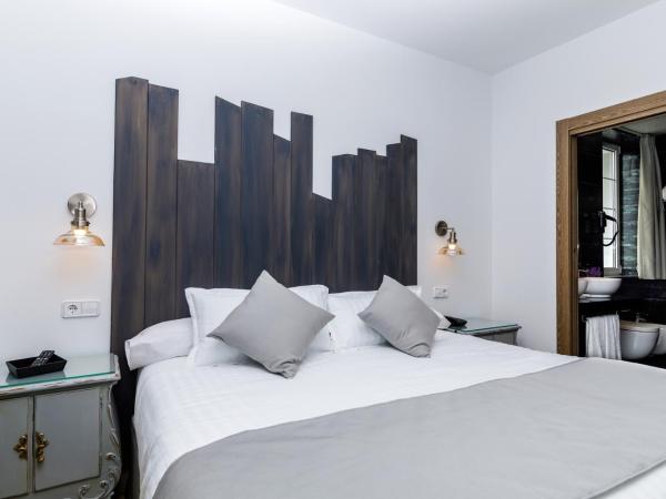 Suite Home Pinares : photo 3 de la chambre chambre double ou lits jumeaux