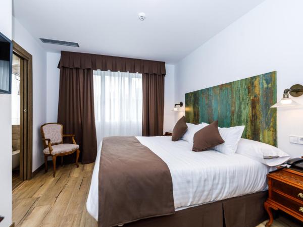 Suite Home Pinares : photo 2 de la chambre chambre double standard