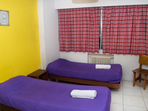 Marcopolo Inn Hostel Bariloche : photo 1 de la chambre chambre lits jumeaux