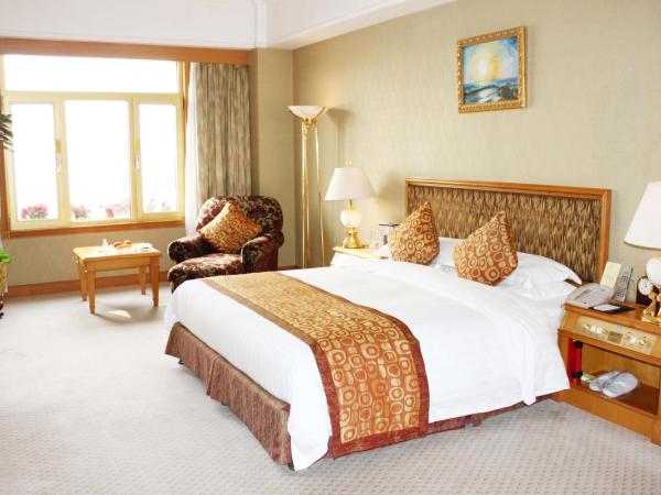 Qingdao Oceanwide Elite Hotel : photo 1 de la chambre suite exclusive