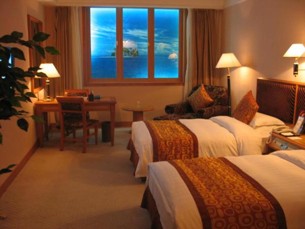 Qingdao Oceanwide Elite Hotel : photo 1 de la chambre chambre lits jumeaux affaires (sans fenêtre)