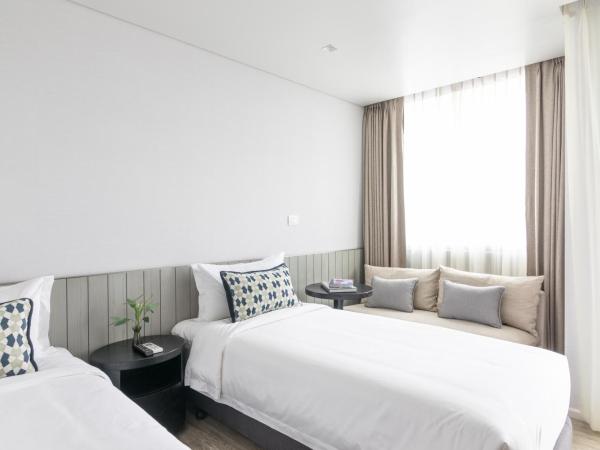 Apartelle Jatujak Hotel : photo 3 de la chambre chambre lits jumeaux premium