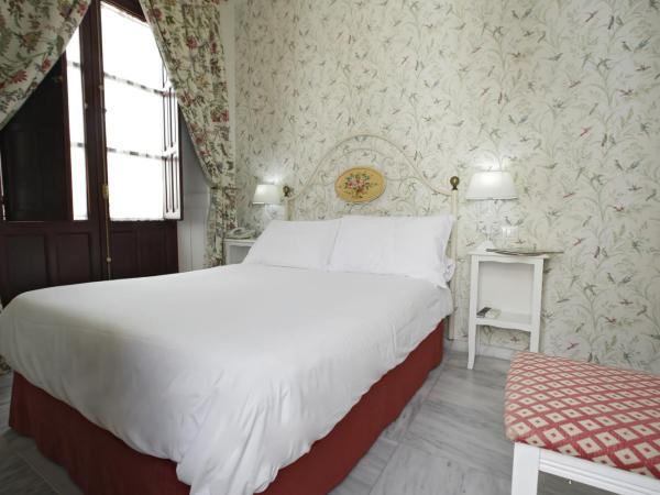 Basic Hotel Puerta de Sevilla : photo 2 de la chambre chambre double Économique