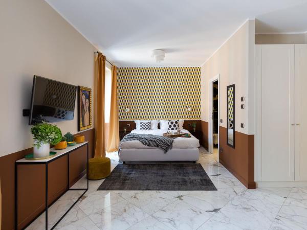 Zebra Naviglio : photo 1 de la chambre suite deluxe avec lit king-size