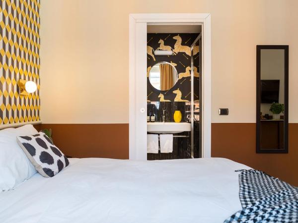 Zebra Naviglio : photo 7 de la chambre suite deluxe avec lit king-size