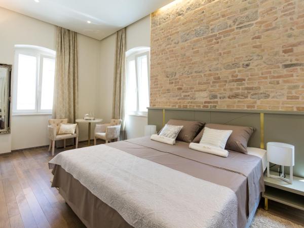 Riva Palace : photo 2 de la chambre chambre double ou lits jumeaux supérieure avec vue sur ville