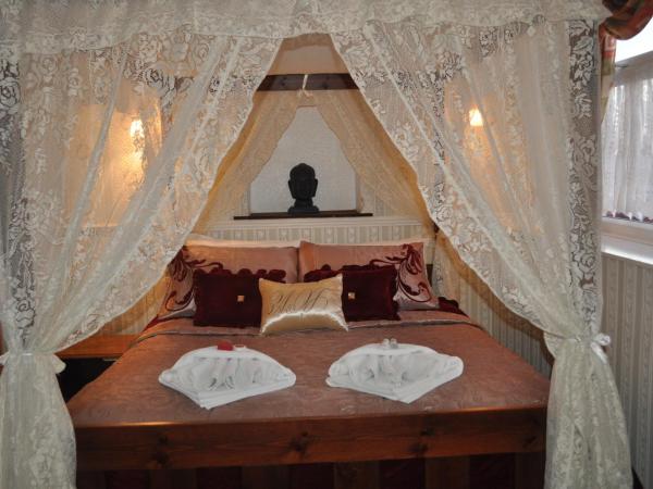 The New Guilderoy Hotel : photo 5 de la chambre suite avec lit à baldaquin