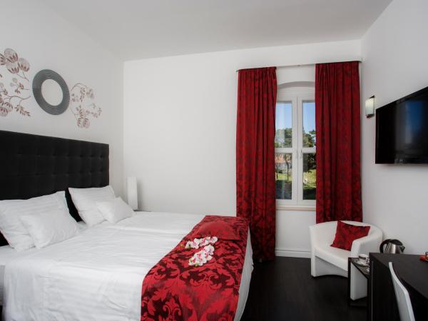 Sleep Split : photo 4 de la chambre chambre lits jumeaux supérieure - vue sur ville