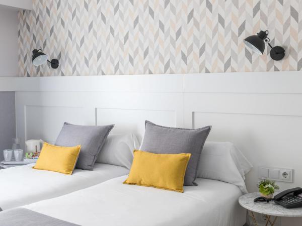 BYPILLOW Velázquez 45 : photo 4 de la chambre chambre lits jumeaux