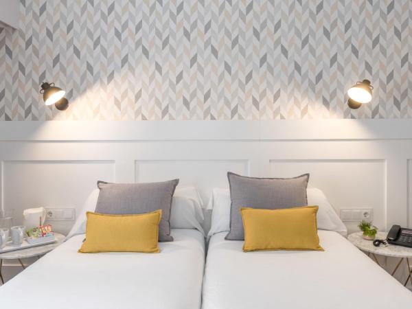BYPILLOW Velázquez 45 : photo 2 de la chambre chambre lits jumeaux