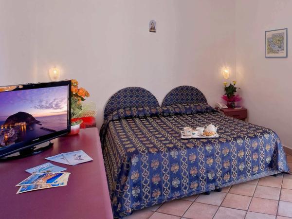 Hotel Residence S.Angelo : photo 3 de la chambre chambre quadruple - vue sur jardin