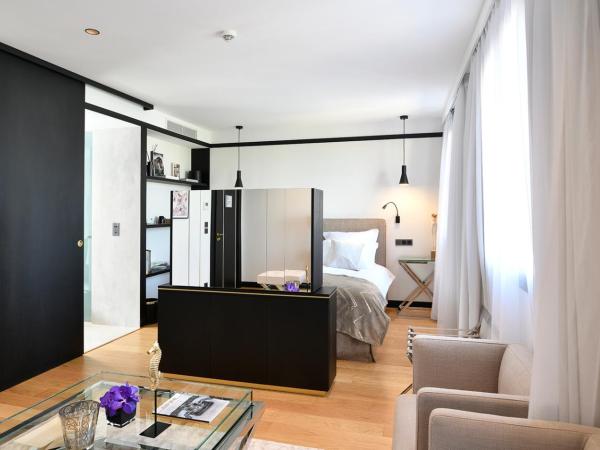 Hôtel Restaurant le Touring - Teritoria : photo 3 de la chambre suite deluxe - vue sur mer