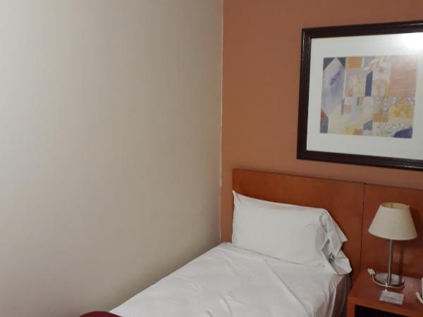 Hotel UTHGRA de las Luces : photo 7 de la chambre petite chambre simple
