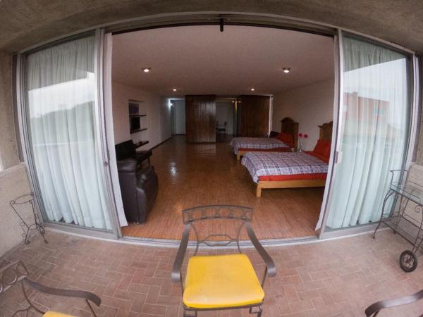Suites Las Plazas : photo 3 de la chambre chambre lits jumeaux avec balcon