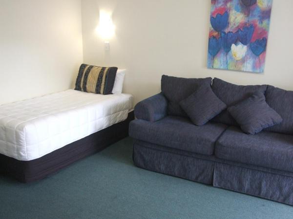 Palm Court Motor Inn : photo 5 de la chambre appartement 2 chambres avec bain à remous