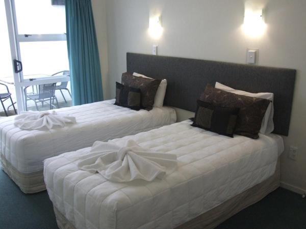 Palm Court Motor Inn : photo 4 de la chambre appartement 2 chambres avec bain à remous