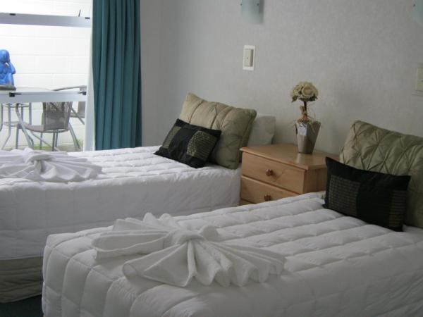 Palm Court Motor Inn : photo 9 de la chambre appartement 2 chambres avec bain à remous