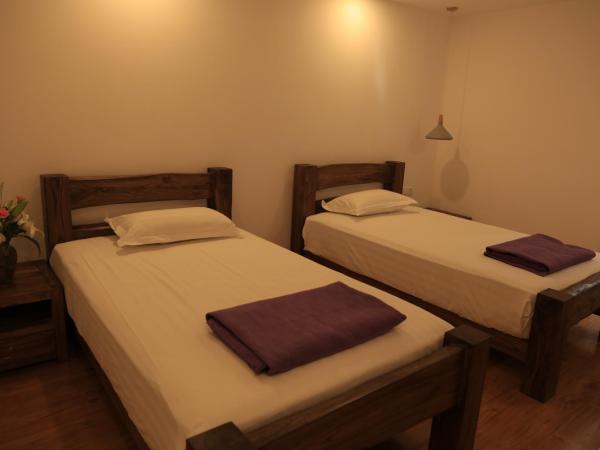 Beijing Downtown Travelotel : photo 5 de la chambre chambre lits jumeaux deluxe