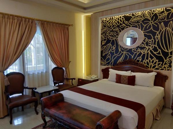 Hotel Indah Palace Yogyakarta : photo 2 de la chambre chambre double deluxe avec douche