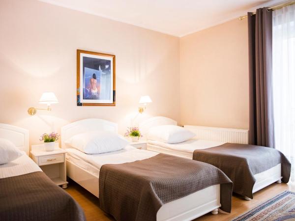 Hotel Renusz : photo 4 de la chambre chambre triple