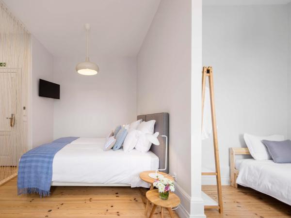 Penedo da Saudade Suites & Hostel : photo 1 de la chambre chambre familiale supérieure