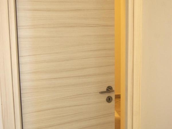 La Terrazza sul Mare : photo 4 de la chambre chambre lit queen-size - vue sur jardin