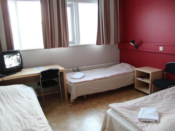 Santa's Hotel Rudolf : photo 2 de la chambre economy triple