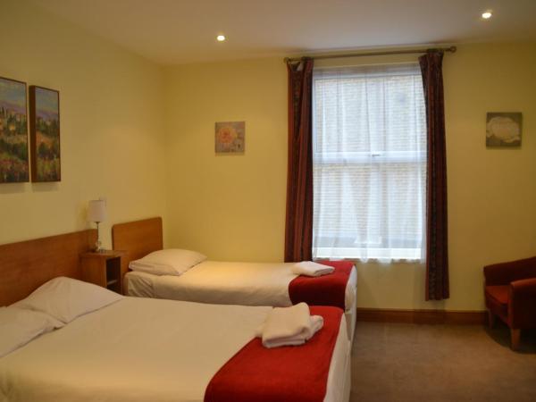 Hotel 65 : photo 8 de la chambre chambre quadruple