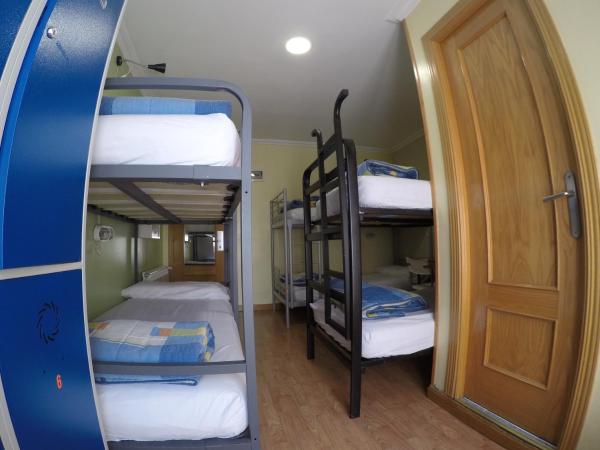 RC Miguel Angel : photo 1 de la chambre lit dans dortoir de 6 lits avec salle de bains privative 