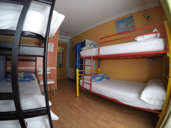RC Miguel Angel : photo 1 de la chambre lit dans dortoir de 4 lits avec salle de bains privative