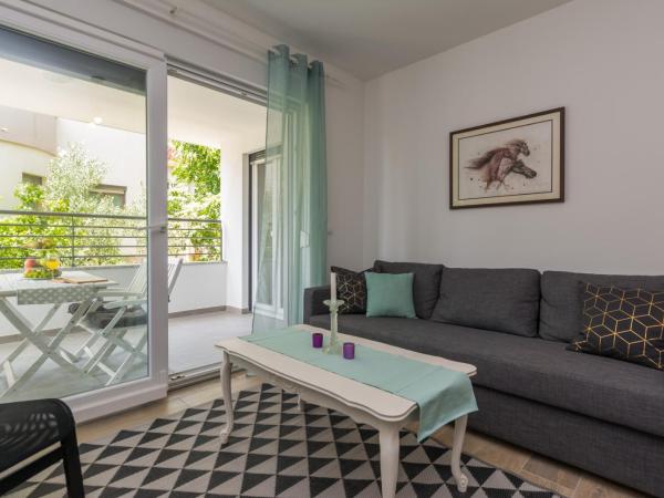 Apartments Marta 1 : photo 4 de la chambre appartement - vue sur jardin