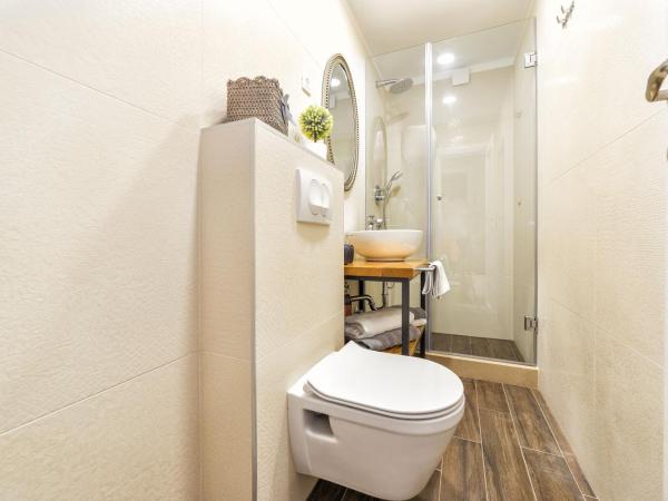 Karmelita's place : photo 3 de la chambre chambre lit king-size