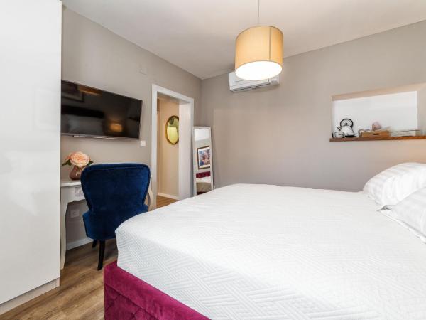 Karmelita's place : photo 1 de la chambre chambre lit king-size