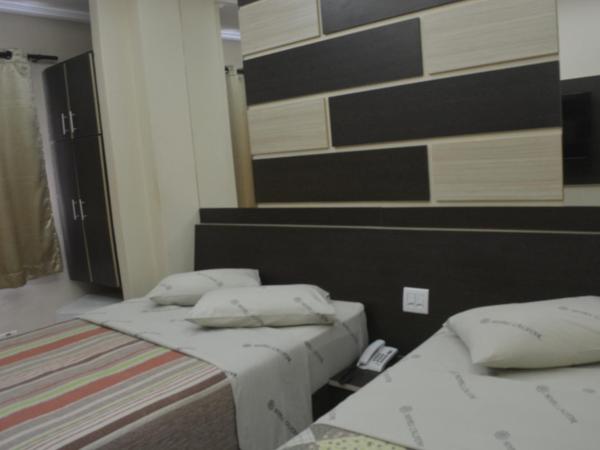 Hotel Calstar : photo 6 de la chambre chambre triple deluxe avec 1 lit double et 1 lit simple