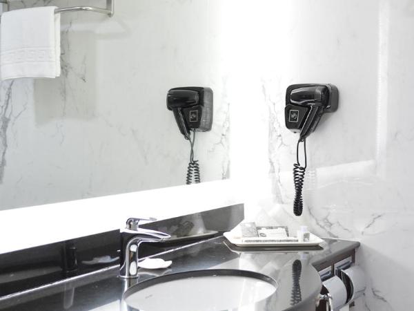 Corus Hotel Kuala Lumpur : photo 5 de la chambre chambre lits jumeaux exécutive deluxe