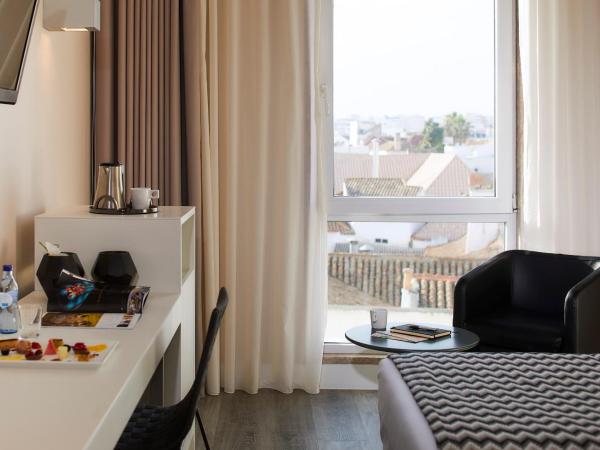 Hotel Faro & Beach Club : photo 5 de la chambre chambre double ou lits jumeaux supérieure