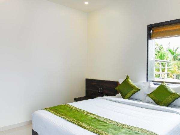 Treebo Malhaar Regency : photo 5 de la chambre chambre double ou lits jumeaux standard