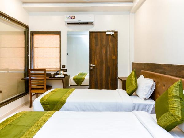 Treebo Malhaar Regency : photo 8 de la chambre chambre double ou lits jumeaux standard